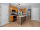 Stylish kitchen with stainless steel appliances, a central island, and ample cabinet space at 211 Augusta Woods Dr, Villa Rica, GA 30180