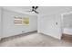 Cozy bedroom with a large window that offers great natural light and a view of the exterior at 2678 Rainbow Forest Dr, Decatur, GA 30034