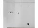 Utility closet featuring washer and dryer hookups and wire shelving for storage at 2678 Rainbow Forest Dr, Decatur, GA 30034