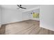 Open-concept living room with light wood floors, recessed lighting, and plenty of natural light at 2678 Rainbow Forest Dr, Decatur, GA 30034