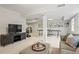 Spacious finished basement with furniture, built-in shelving and recreation equipment at 4792 Fairville Ct, Marietta, GA 30062