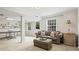 Finished basement with sofa, ping pong table and built-in shelving at 4792 Fairville Ct, Marietta, GA 30062