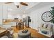 Spacious kitchen offering stainless appliances, white cabinets, granite countertops, and hardwood floors at 4792 Fairville Ct, Marietta, GA 30062