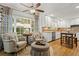 Bright kitchen featuring white cabinetry, stainless steel appliances, and a charming breakfast island at 4792 Fairville Ct, Marietta, GA 30062