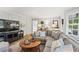 Inviting living room with hardwood floors, a fireplace, and a comfortable sectional sofa at 4792 Fairville Ct, Marietta, GA 30062
