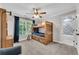 Inviting bedroom featuring built-in bunk beds, a window and carpet at 5301 Regency Lake Ct, Sugar Hill, GA 30518