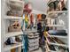 Well-organized walk-in closet with ample shelving and storage space at 5301 Regency Lake Ct, Sugar Hill, GA 30518