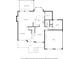 Main level floor plan featuring living room, kitchen, bedroom, dining area, and garage at 5301 Regency Lake Ct, Sugar Hill, GA 30518