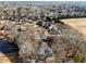 Aerial shot featuring a home situated near a body of water surrounded by numerous neighborhood homes at 6170 Wellington Ct, Cumming, GA 30040