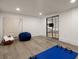 Minimalist home gym with workout space and natural lighting, offering room for activities at 6170 Wellington Ct, Cumming, GA 30040
