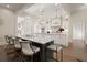 Bright kitchen features an expansive island with seating, stainless steel appliances, and a seamless design at 6170 Wellington Ct, Cumming, GA 30040