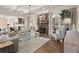 Spacious living room showcasing a stone fireplace, neutral decor, and abundant natural light at 6170 Wellington Ct, Cumming, GA 30040