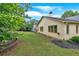 Lush backyard with manicured lawn, mulched flowerbeds, and tidy exterior, perfect for relaxing or entertaining at 123 Patrick Way, Marietta, GA 30064
