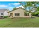 Well-maintained backyard with a lush lawn and a charming covered porch, perfect for relaxing and enjoying the outdoors at 123 Patrick Way, Marietta, GA 30064