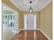 Spacious front foyer featuring warm paint and views to the outside at 123 Patrick Way, Marietta, GA 30064
