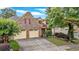 Lovely home featuring a stone facade, a two-car garage, and manicured landscaping enhancing its curb appeal at 123 Patrick Way, Marietta, GA 30064