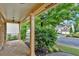 Inviting front porch with stone flooring and lovely garden views at 123 Patrick Way, Marietta, GA 30064