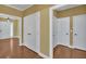 A hallway with hardwood floors and lots of storage at 123 Patrick Way, Marietta, GA 30064
