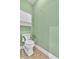 Bathroom with comfort height toilet and handrails at 123 Patrick Way, Marietta, GA 30064