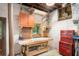 Basement workshop featuring a workbench, tool storage, and natural light at 1706 Remington Rd, Atlanta, GA 30341