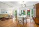 Inviting dining area featuring a modern chandelier and natural light from patio doors at 1706 Remington Rd, Atlanta, GA 30341