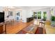 Open-concept living area with hardwood floors, connecting to dining area and kitchen at 1706 Remington Rd, Atlanta, GA 30341