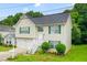 Charming two-story home with a lush green lawn, attached garage, and inviting curb appeal at 3599 Salem Glen Rd, Lithonia, GA 30038