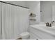Clean bathroom offers a shower, toilet, and vanity, providing essential comfort with functional design at 7190 Tributary Ct, Cumming, GA 30040