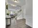 Inviting entryway boasts hardwood floors, staircase, and access to a spacious living area, creating a warm welcome at 7190 Tributary Ct, Cumming, GA 30040