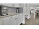 Convenient kitchen features modern cabinets and a breakfast area, perfect for quick meals and Gathering gatherings at 7190 Tributary Ct, Cumming, GA 30040