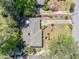 Aerial view of a well-maintained property featuring mature trees and manicured landscaping at 755 Monticello Se Way, Marietta, GA 30067
