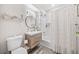 Clean bathroom featuring new vanity, stylish tile, and modern fixtures at 755 Monticello Se Way, Marietta, GA 30067