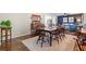 Open floor plan showcasing the dining area with a dark wood table, open to the living area at 755 Monticello Se Way, Marietta, GA 30067