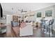Bright living room featuring hardwood floors, ceiling fan, lots of windows and comfortable seating at 755 Monticello Se Way, Marietta, GA 30067