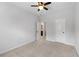 Open bedroom with neutral carpet and easy access to an ensuite bathroom at 2022 Talmai Dr, Snellville, GA 30078