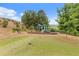 Community playground with slides and green space for Gathering fun and outdoor activity at 2022 Talmai Dr, Snellville, GA 30078
