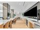 Elegant bar and lounge area with ample counter space, modern appliances, and comfortable seating at 2425 Peachtree Ne Rd # 902, Atlanta, GA 30305