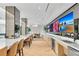 Elegant bar and lounge area with ample counter space, modern appliances, and comfortable seating at 2425 Peachtree Ne Rd # 902, Atlanta, GA 30305
