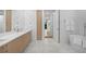 Bright bathroom with white marble floors, quartz countertop, and modern fixtures at 2425 Peachtree Ne Rd # 902, Atlanta, GA 30305