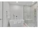 Modern bathroom with freestanding tub, glass-enclosed shower and contemporary fixtures at 2425 Peachtree Ne Rd # 902, Atlanta, GA 30305