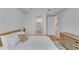 Cozy bedroom with views, featuring a bed, dresser, and an open doorway to the closet at 2425 Peachtree Ne Rd # 902, Atlanta, GA 30305