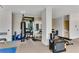Spacious home gym features various equipment including weights, punching bag, and exercise mats for a complete workout experience at 2425 Peachtree Ne Rd # 902, Atlanta, GA 30305