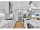 Modern kitchen with white cabinetry, stainless steel appliances, and a spacious island at 2425 Peachtree Ne Rd # 902, Atlanta, GA 30305