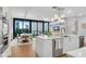 Open-concept kitchen and dining area featuring modern appliances and a bright, airy atmosphere at 2425 Peachtree Ne Rd # 902, Atlanta, GA 30305