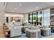 Bright and airy living room with large windows, modern decor, and comfortable seating arrangement at 2425 Peachtree Ne Rd # 902, Atlanta, GA 30305