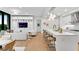 Spacious living area showcasing an open concept with modern kitchen, living, and dining areas at 2425 Peachtree Ne Rd # 902, Atlanta, GA 30305