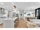 Modern open living area with dining, kitchen and living spaces featuring contemporary design and natural light at 2425 Peachtree Ne Rd # 902, Atlanta, GA 30305