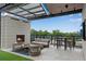Stylish outdoor lounge area with fireplace, comfortable seating, and city views at 2425 Peachtree Ne Rd # 902, Atlanta, GA 30305