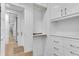 Bright walk-in closet with custom shelving and drawers, perfect for organizing any wardrobe at 2425 Peachtree Ne Rd # 902, Atlanta, GA 30305
