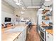 Spacious kitchen featuring wooden countertops, sink, and an open layout to adjacent living spaces at 5097 Peachtree Rd # I, Atlanta, GA 30341